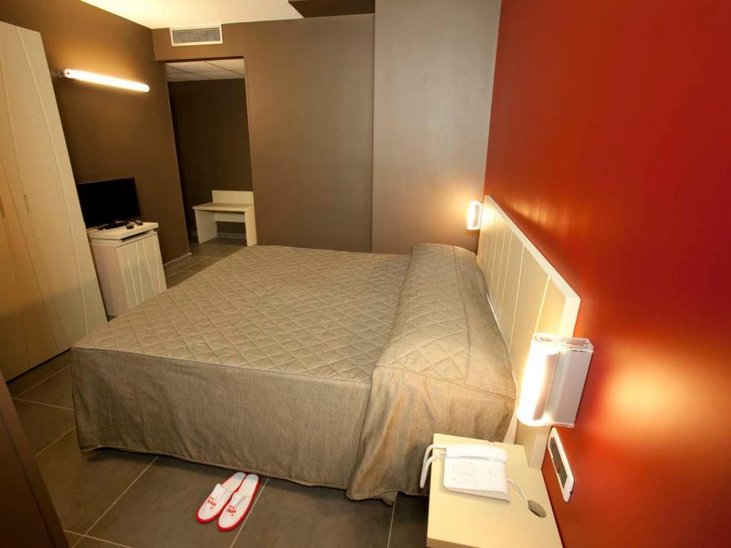 Rolling Hotel Casoria Habitación foto